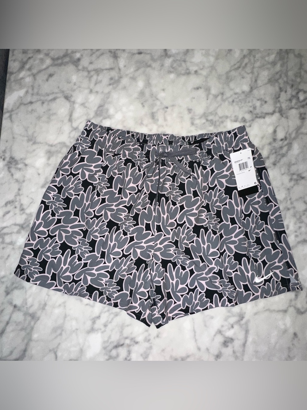 Nike Women's Black & Light Pink Floral Athletic Shorts